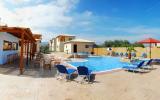 Holiday villa with shared pool in Zakynthos, Laganas - walking, beach/lake nearby, balcony/terrace, air con, rural retreat, TV,