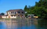 Rocky Point Vista – Charming Home with Panoramic Lake Views
